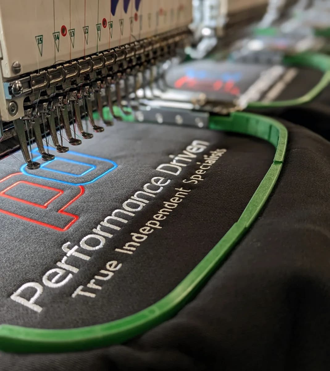 Custom embroidered workwear sample with company logo — embroidery services Farnborough